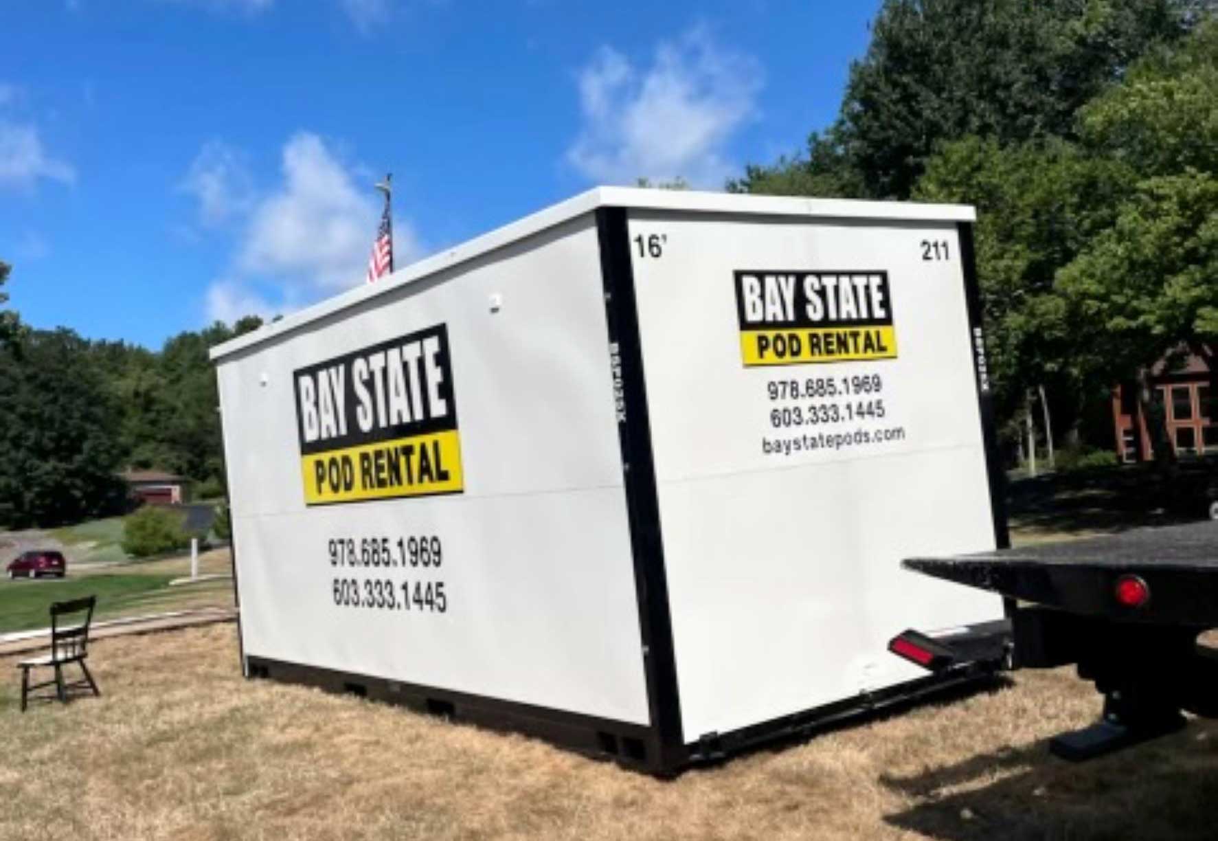 Two rental pods in parking lot